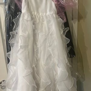 Little girls David’s Bridal elegant flowing WHITE flower girl dress.